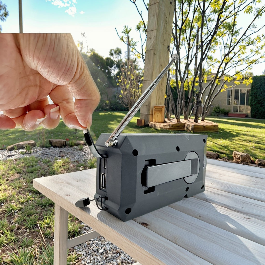 Portable Emergency Weather Radio with 2000mAh Phone Charger, AM/FM/NOAA, High-Efficiency Solar Power, LED Flashlight, SOS Alarm, and Hand Crank Backup